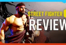 A muscular male fighter with a red headband is shown next to the words “Street Fighter 6 Review” in bold text on a stylized background.